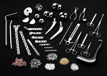 THE SURFACE TREATMENT oF MEDICAL COMPONENTS WITH MASS FINISHING &Amp; SHOT BLASTING